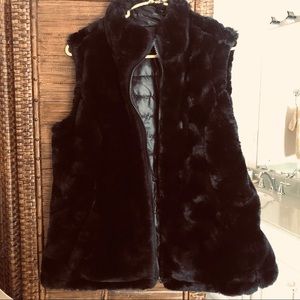 Costco reversible vest. Never worn faux fur and vinyl. Black